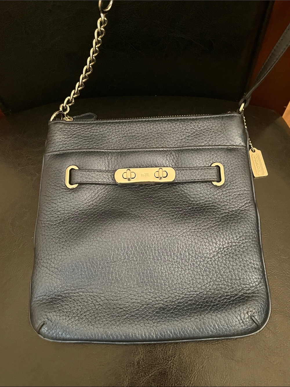 Metallic blue Coach crossbody purse